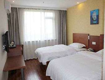 Super 8 By Wyndham Shanghai Jinshan Xuefulu Chengshi Sha Tan Xangai Quarto foto